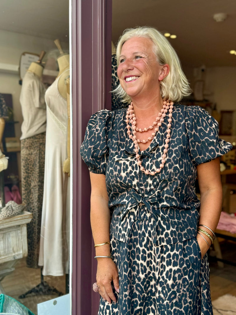 Annie reed wearing sansom reed antique beaded fabric necklace
