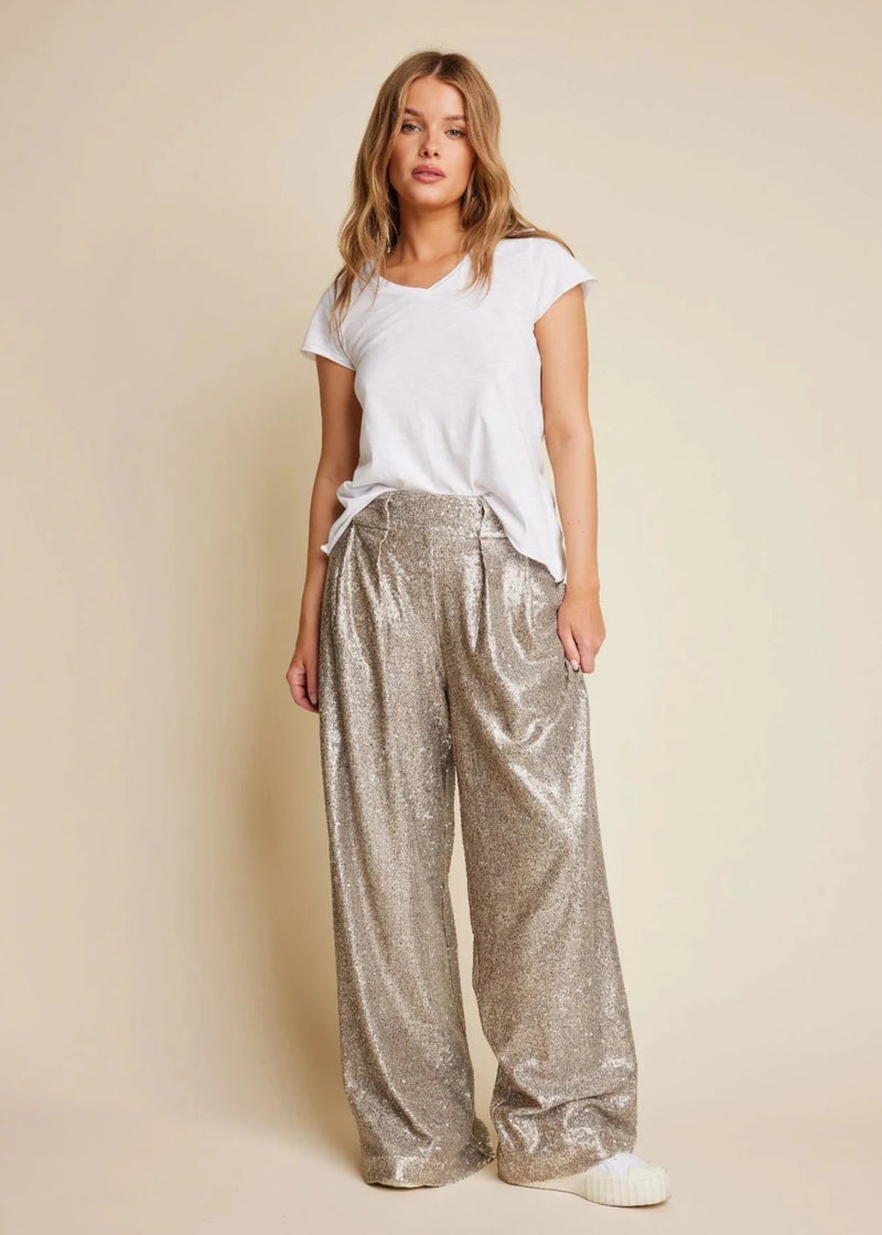 woman wearing Line of Oslo Mister Sequin Trousers (gold)